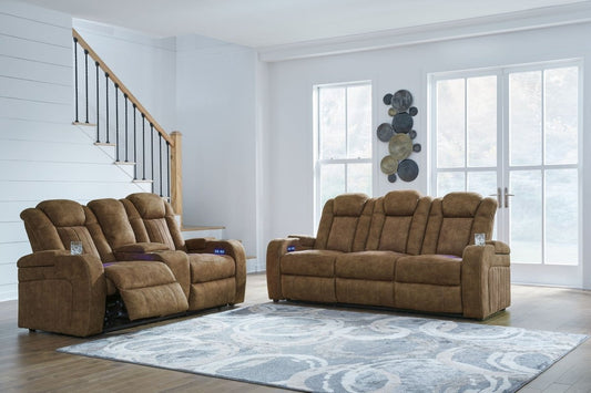 Wolfridge - 2 Pc. - Power Reclining Sofa, Power Reclining Loveseat With Console - Brindle Reclining Sofas & Loveseats by Signature Design by Ashley® - Walls Furniture & Mattress