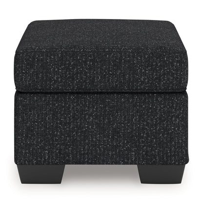 Jasmine Peaks - Ottoman - Coal Upholstered Ottomans by Benchcraft® - Walls Furniture & Mattress