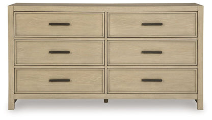 Calmoro - Dresser Dressers by Ashley® - Walls Furniture & Mattress