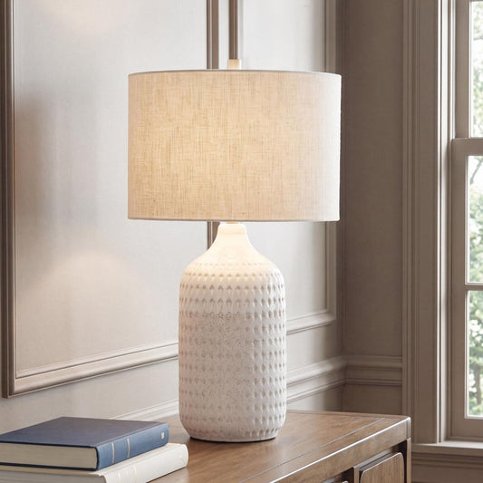 Capwich - Ceramic Table Lamp - Beige / White Table Lamps by Signature Design by Ashley® - Walls Furniture & Mattress