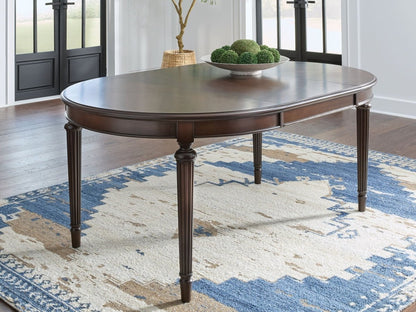 Lavinton - 8 Pc. - Dining Room Extension Table, 6 Side Chairs, Server - Brown 8 + Piece Dining Room Sets by Signature Design by Ashley® - Walls Furniture & Mattress