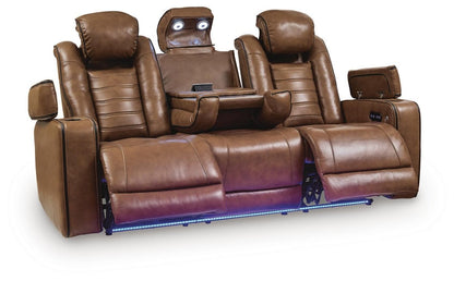 Gruaro - Power Reclining Sofa With Adjustable Headrest - Amber Reclining Sofas by Signature Design by Ashley® - Walls Furniture & Mattress