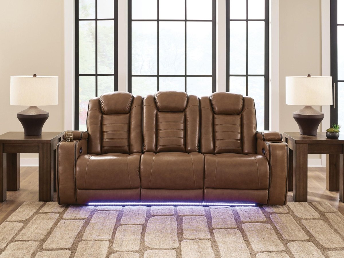 Gruaro - Power Reclining Sofa With Adjustable Headrest - Amber Reclining Sofas by Signature Design by Ashley® - Walls Furniture & Mattress