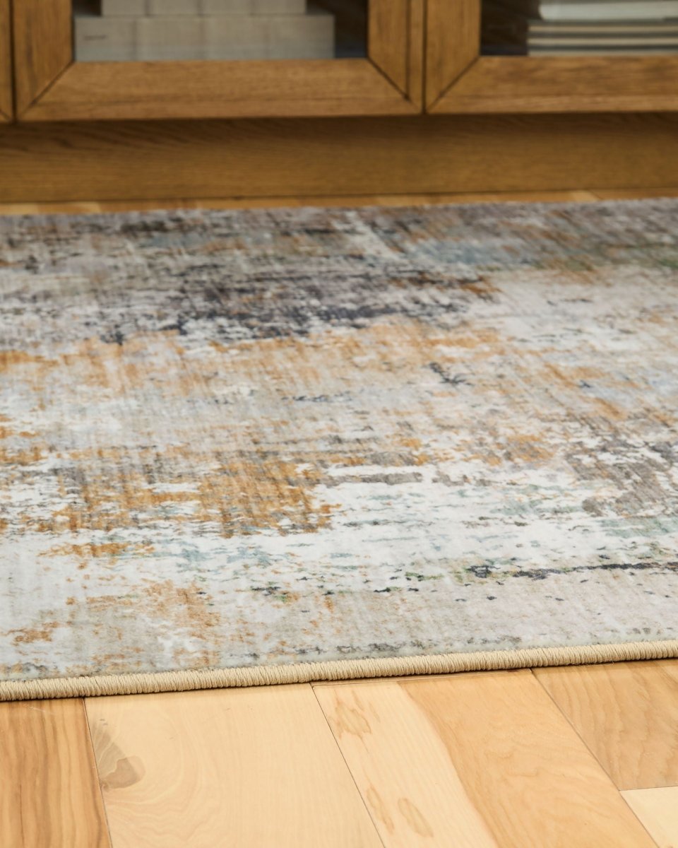 Torinette - Rug Area Rugs by Signature Design by Ashley® - Walls Furniture & Mattress