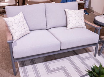 Ocean Beach - Gray - Loveseat With Cushion Loveseats by Signature Design by Ashley® - Walls Furniture & Mattress