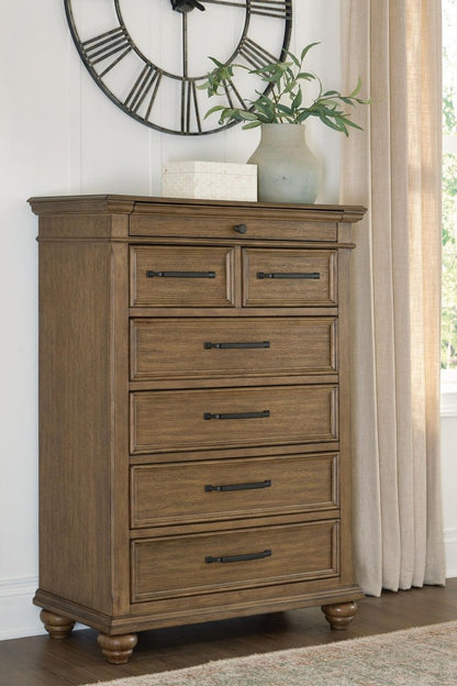 Karallin - Seven Drawer Chest - Medium Brown Accent Chests by Signature Design by Ashley® - Walls Furniture & Mattress