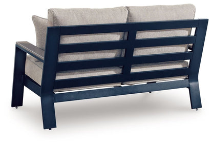 East Beach - Loveseat With Cushion - Blue Loveseats by Signature Design by Ashley® - Walls Furniture & Mattress