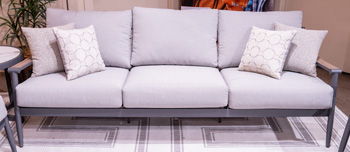 Ocean Beach - Gray - Sofa With Cushion Sofas by Signature Design by Ashley® - Walls Furniture & Mattress