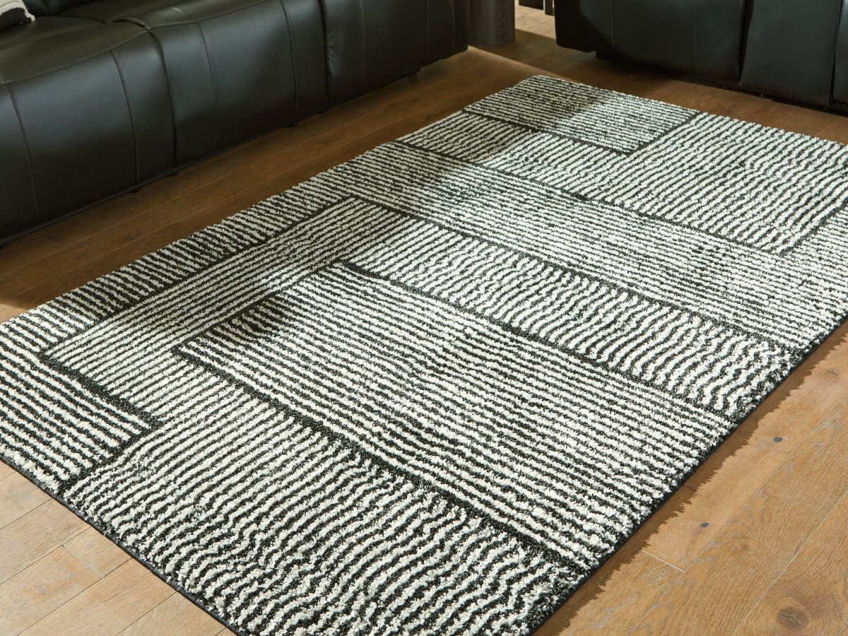 Kurtmen - Rug Area Rugs by Signature Design by Ashley® - Walls Furniture & Mattress