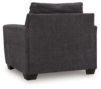 Loreo - Chair - Ebony Arm Chairs by Benchcraft® - Walls Furniture & Mattress