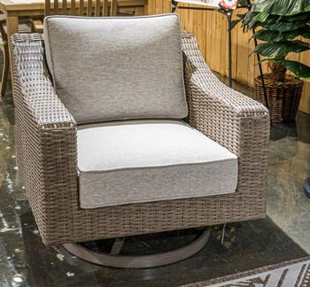 Laguna Heights - Beige - Swivel Lounge With Cushion Swivel Chairs by Signature Design by Ashley® - Walls Furniture & Mattress
