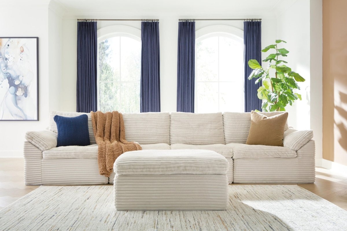 Fannin - 4 - Piece Sectional With Ottoman - Ivory Stationary Sectionals by Signature Design by Ashley® - Walls Furniture & Mattress