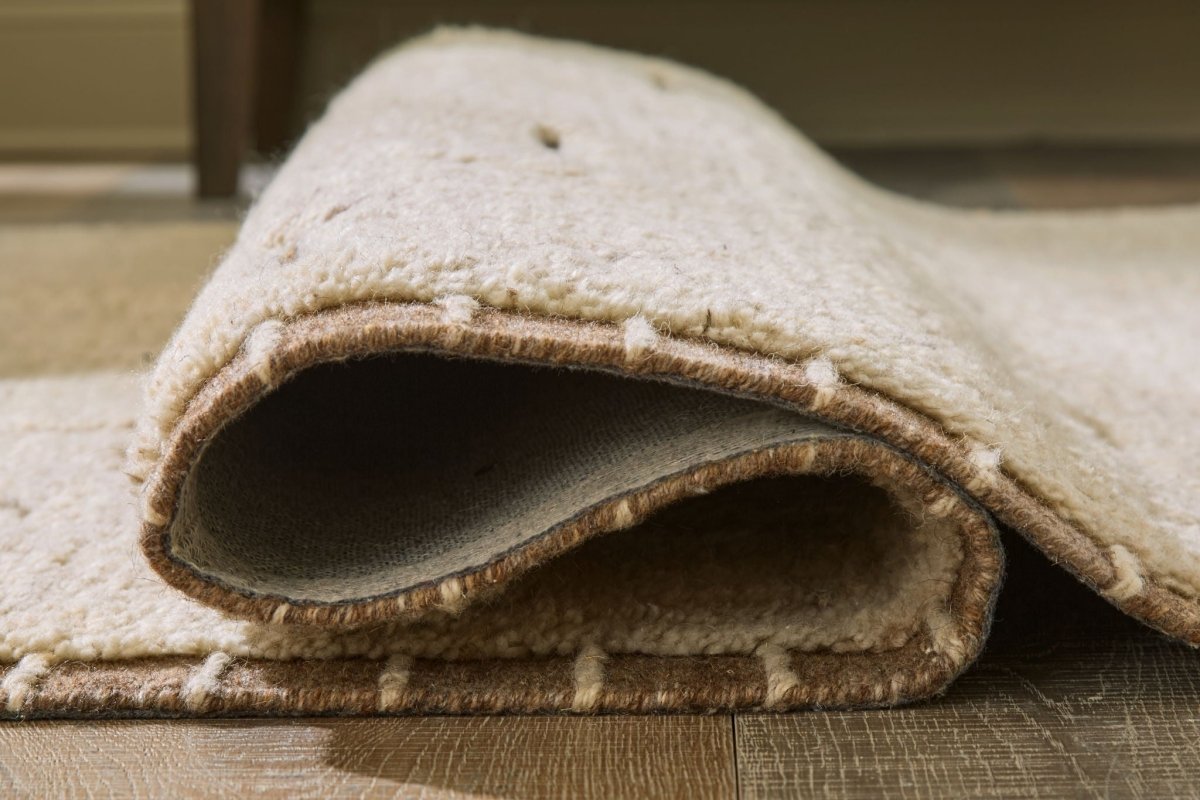 Clayman - Rug Area Rugs by Signature Design by Ashley® - Walls Furniture & Mattress