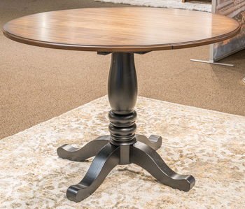 Clorazi - Round Dining Room Drop Leaf Table - Black / Brown Dining Tables by Signature Design by Ashley® - Walls Furniture & Mattress