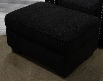 Jasmine Peaks - Coal - Ottoman Upholstered Ottomans by Benchcraft® - Walls Furniture & Mattress